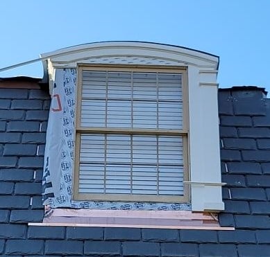 apron flashing at base of a window