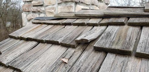 worn and curling cedar shake shingles