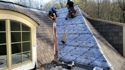 copper installed in roof valley on synthetic shingle roof