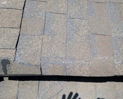 cracked asphalt shingles