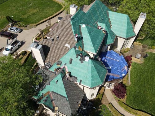 luxury asphalt roof replacement on a complex roof