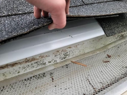 checking for drip edge during a roof inspection