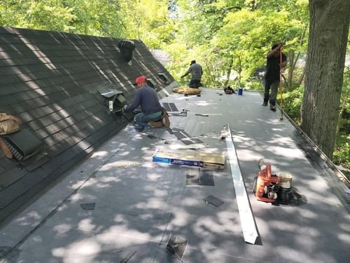 epdm membrane flat roof replacement in progress