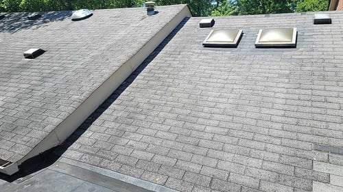 3 tab asphalt shingle roof that has reached the end of its life