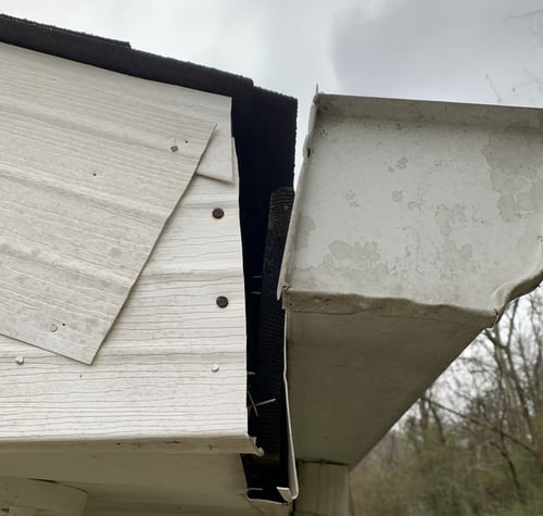 gutters pulling away from roof and home