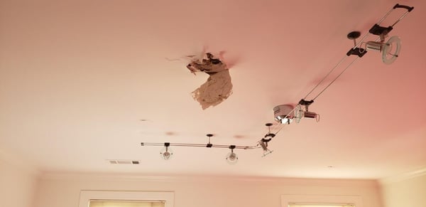 hole in ceiling after a roof replacement