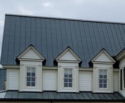 oil canning on a metal roof