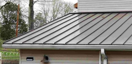 oil canning on a metal roof 