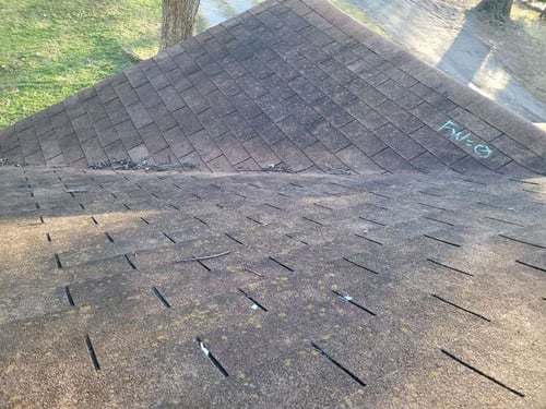 3 tab asphalt shingle roof that needs to be replaced due to old age