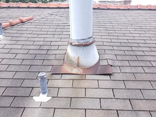 roof leak from collar failure around a gas vent