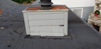 roof leak from chimney siding damage