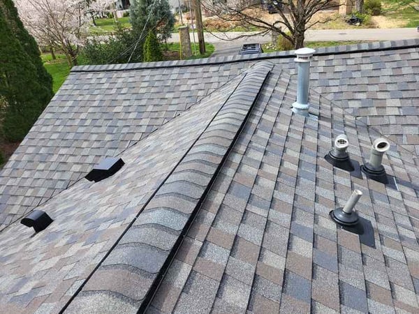 ridge capping on an asphalt shingle roof
