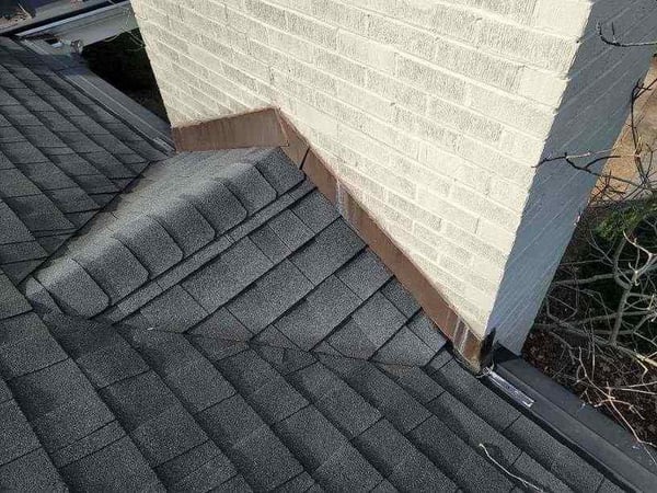 cricket behind a chimney per building codes
