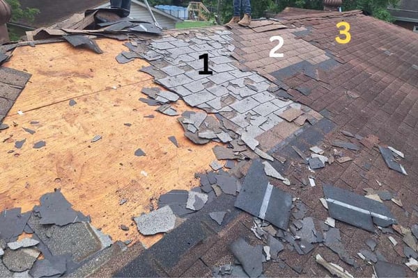 three layers of asphalt shingles after tearing off