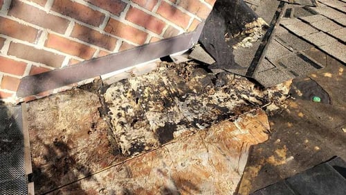 rotten roof decking caused by roof leak