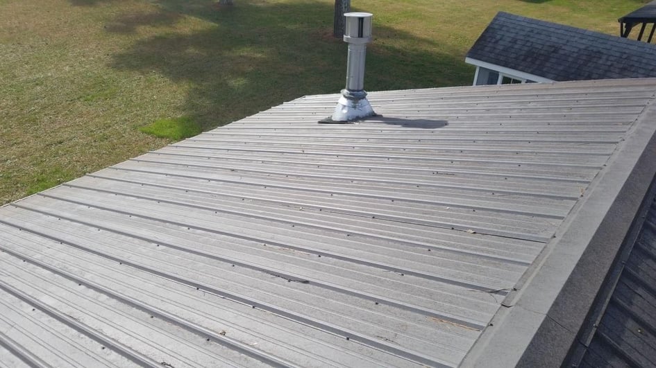 How Much Does a Metal Roof Cost? (Standing Seam and Screw Down Panel)