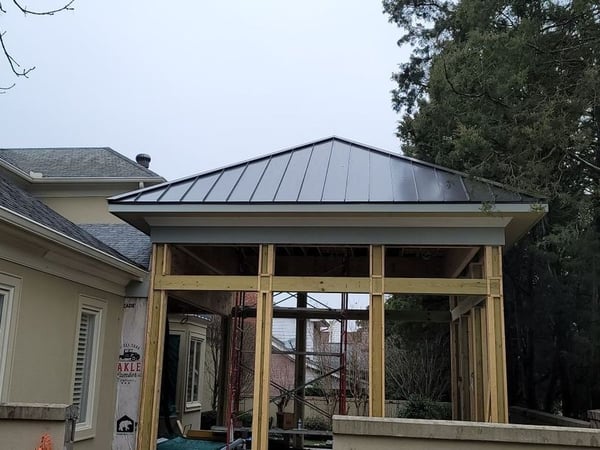 standing seam metal roof over porch