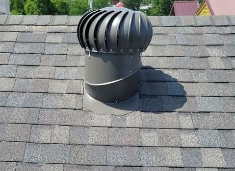 turbine vent on an architectural asphalt shingle roof