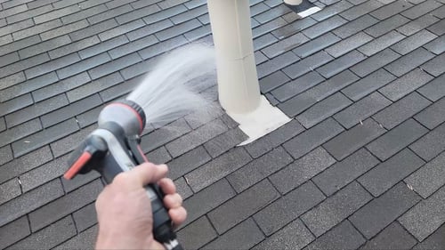 water testing a roof leak after a roof repair